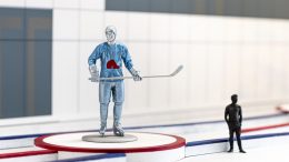 Joueur de hockey avec un chandail des Nordiques et un bâton dans les mains
